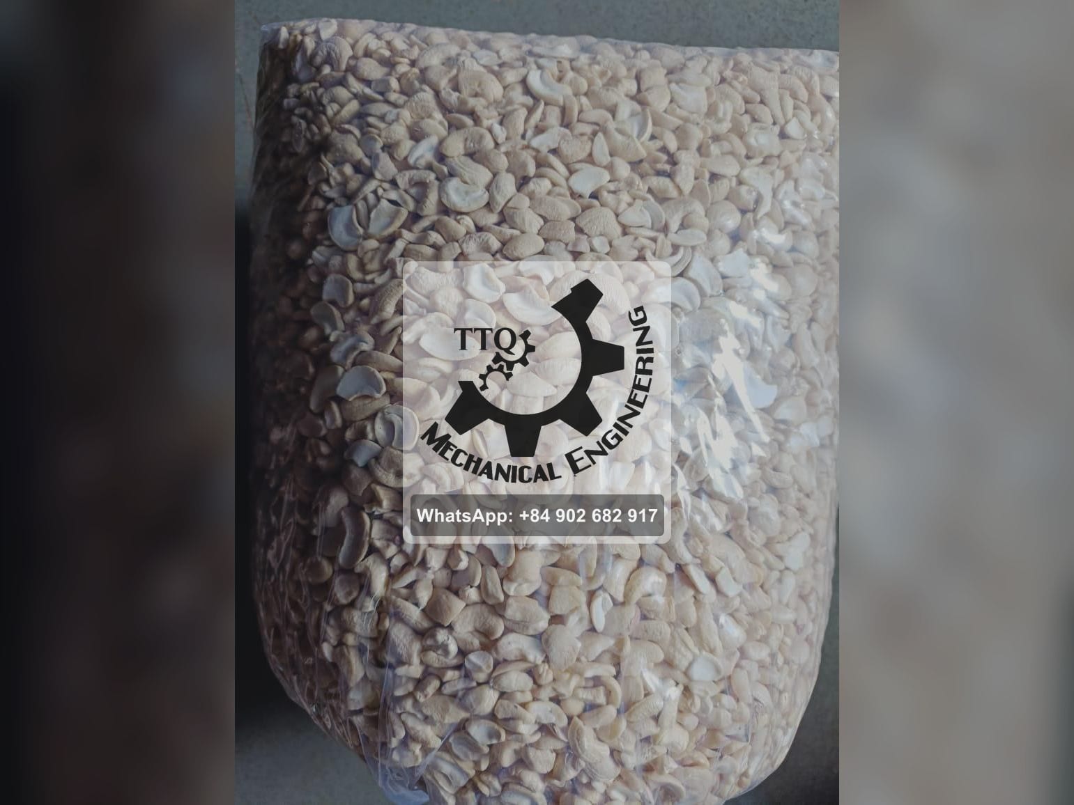 A bag of cashew kernel butts — broken kernels split across the width